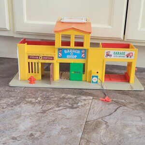 Vintage fisher price barber shop, garage , police station